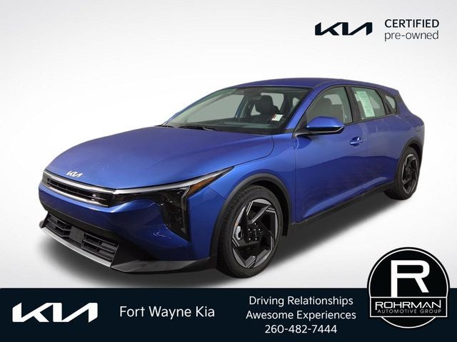 2026 Kia K4 EX in Wave Blue — front three-quarter view