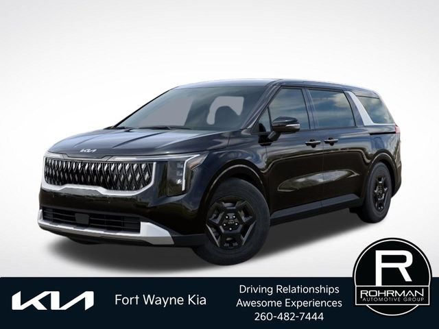 2026 Kia Carnival LXS in Aurora Black Pearl — front three-quarter view
