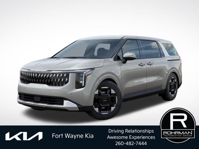 2026 Kia Carnival EX in Ivory Silver — front three-quarter view