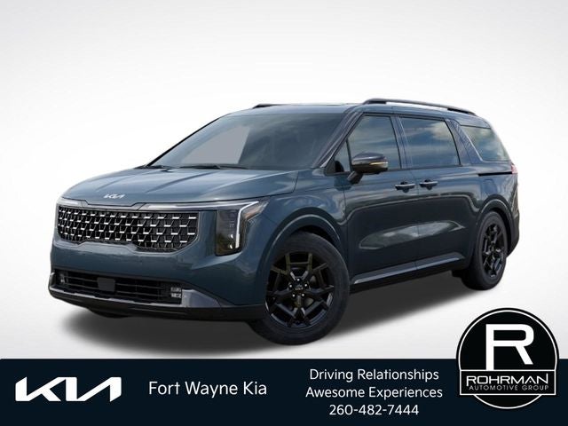 2026 Kia Carnival SX Prestige in Astra Blue — front three-quarter view